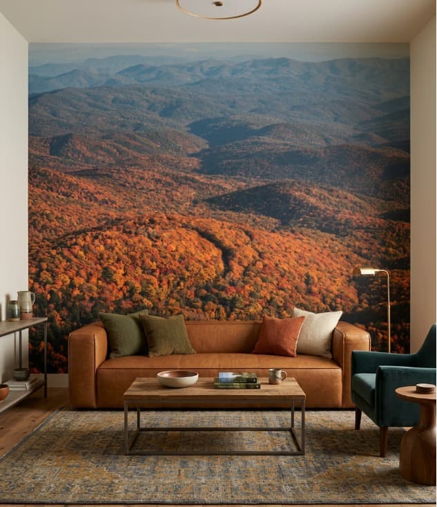 Calm bedroom with a custom wall mural behind the bed